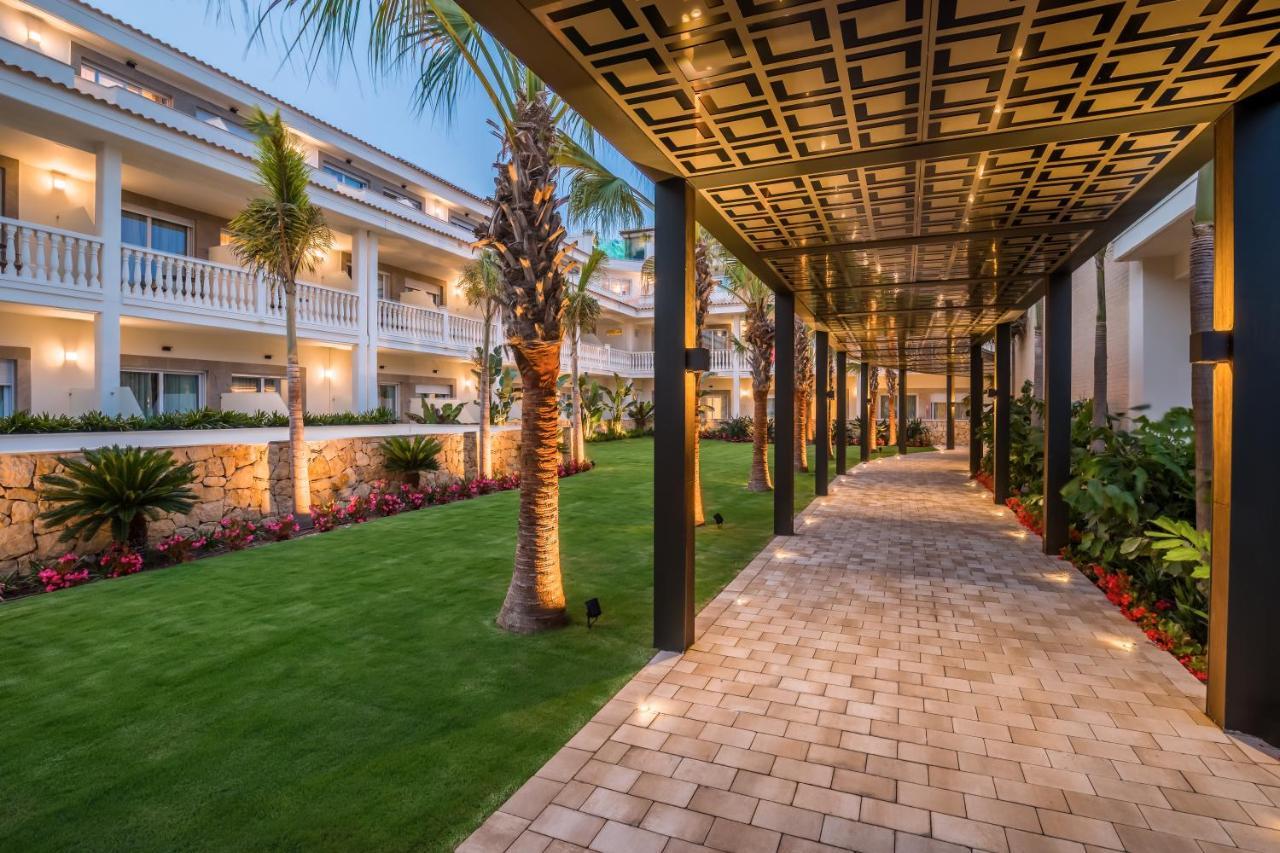 Barcelo La Nucia Palms Hotel Exterior photo The resort's main walkway